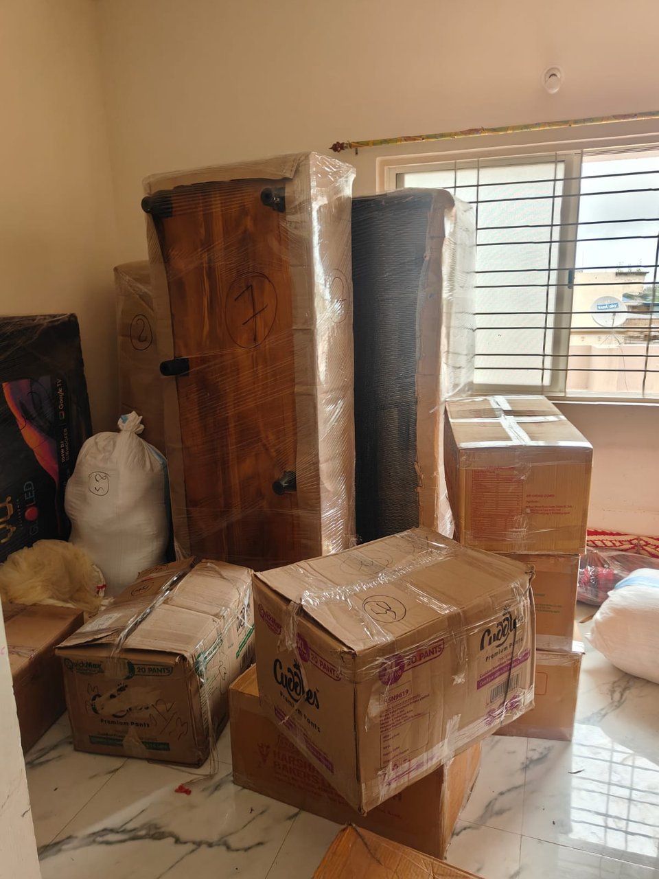 Shekhawat Packers and Movers Dharwad - household goods packed and ready for transport